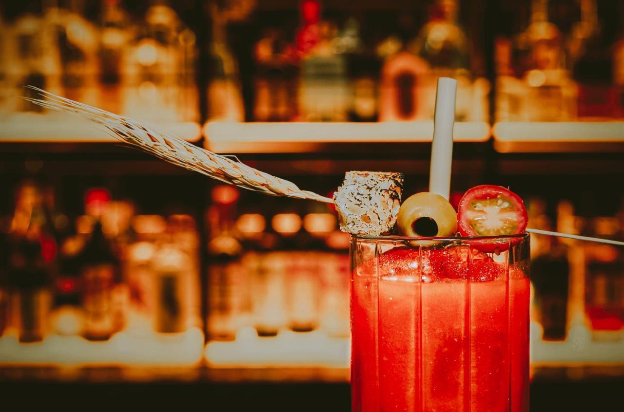 The Mayfair Townhouse - An Iconic Luxury Hotel London Exterior photo A Bloody Mary cocktail