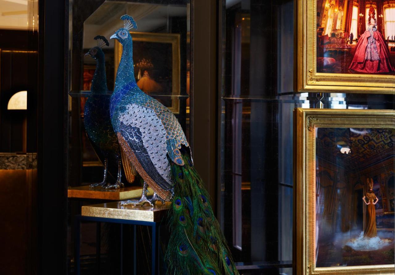 The Mayfair Townhouse - An Iconic Luxury Hotel London Exterior photo Peacock sculpture