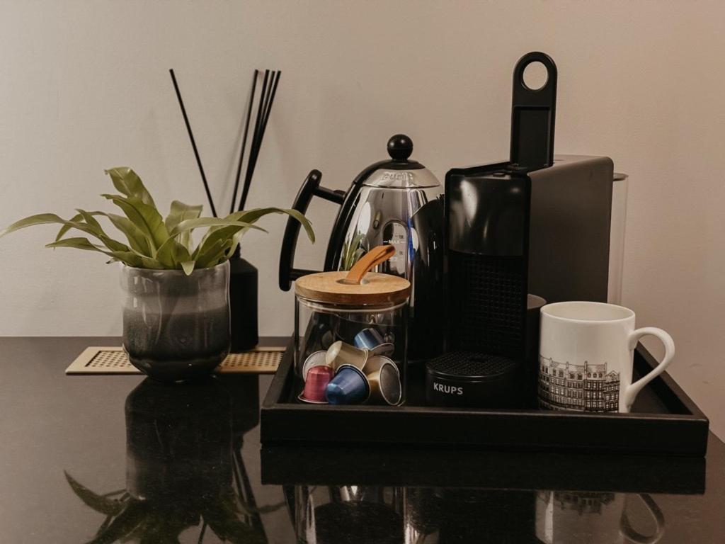 The Mayfair Townhouse - An Iconic Luxury Hotel London Exterior photo A Nespresso coffee machine