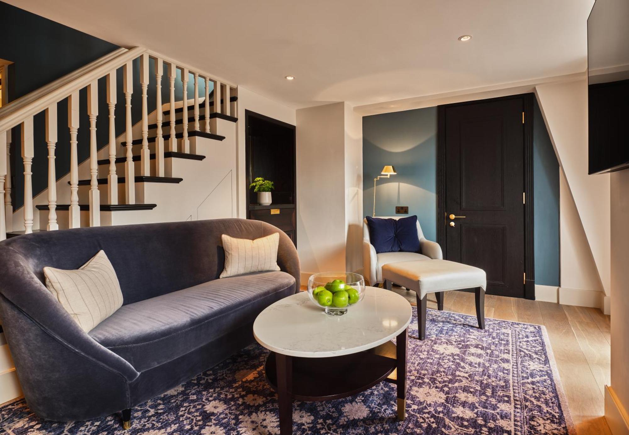 The Mayfair Townhouse - An Iconic Luxury Hotel London Exterior photo A living room at the hotel